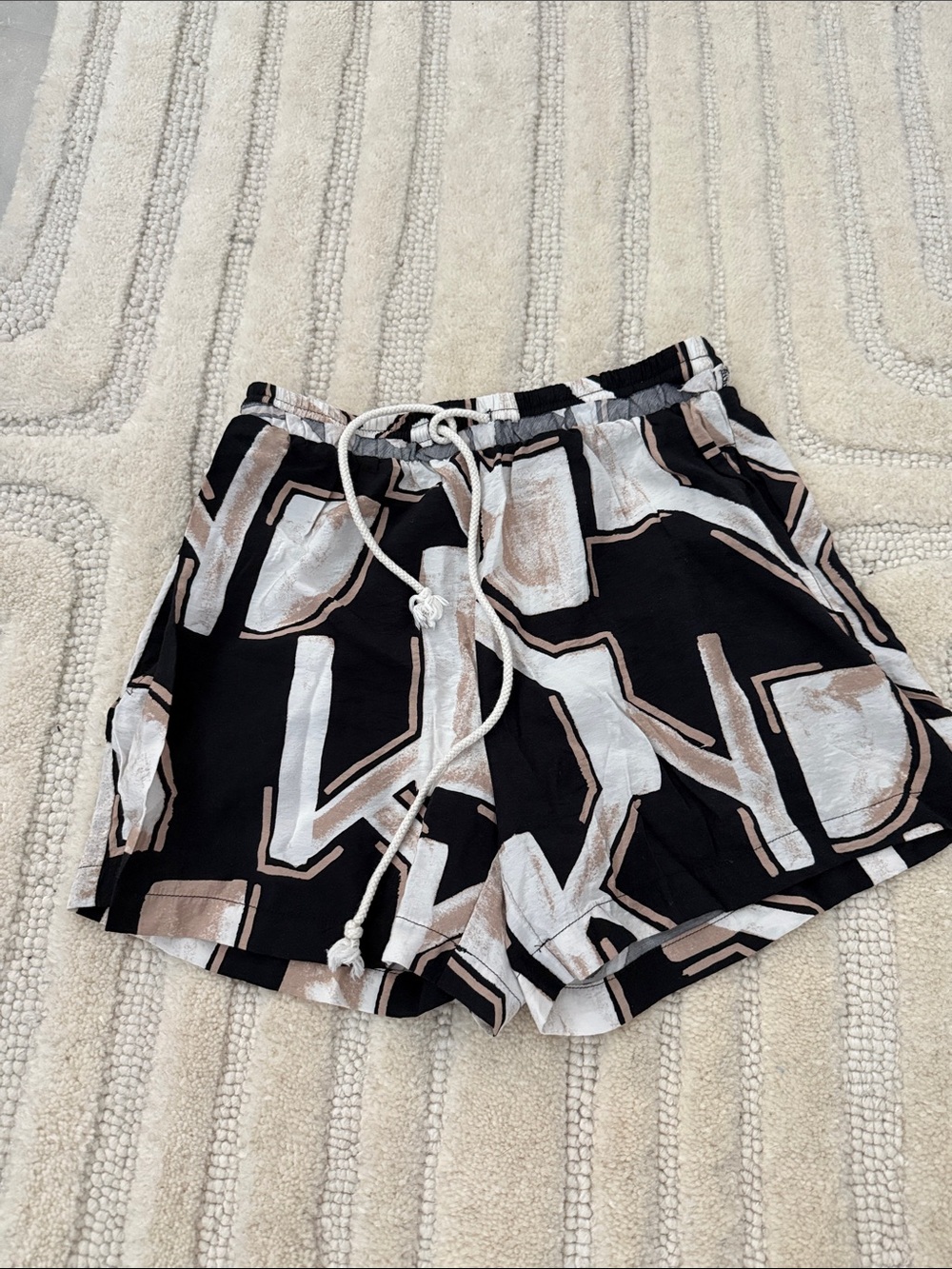 Women’s vacation Black Shorts with Beige & White Geometric Print